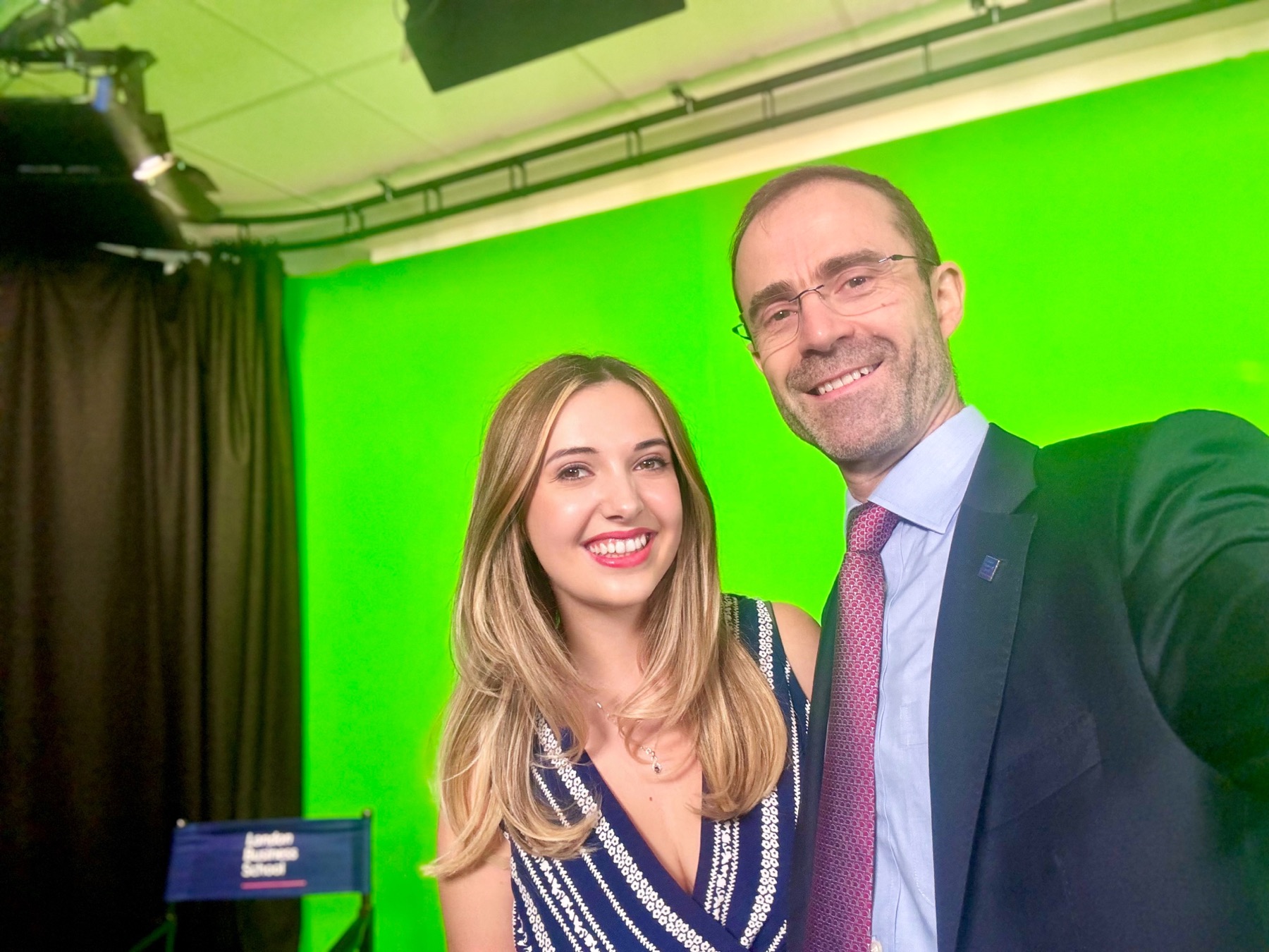 Mihaela Motica with London Business School's then Dean after filming in a green-screen studio